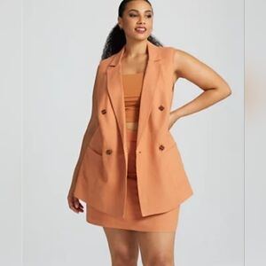Gabrielle union sleeveless blazer and skirt set